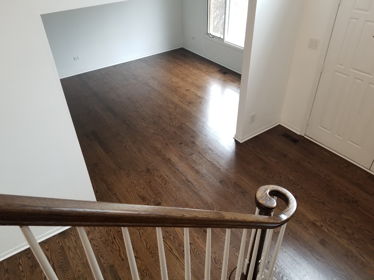 Dark walnut stain on wood floor