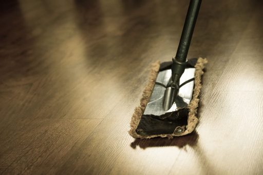 Cleaning wood floor after carpet tape removal to clear leftover adhesive and residue